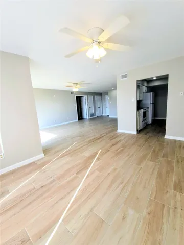 a view of a livingroom with a staircase