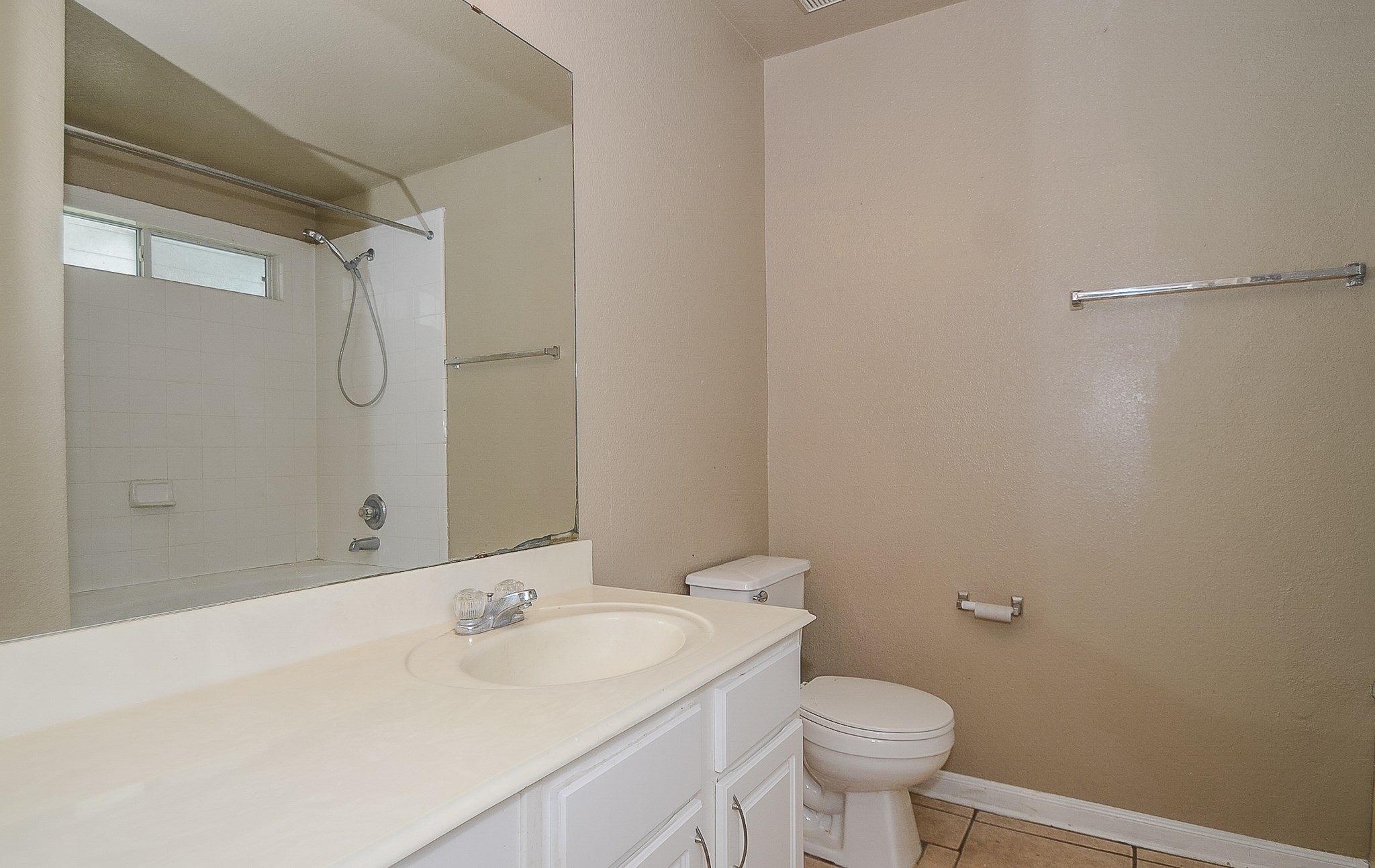 11711 Wainscot Court Houston, TX 77038 - Photo 17 of 32 a bathroom with a sink a toilet and shower