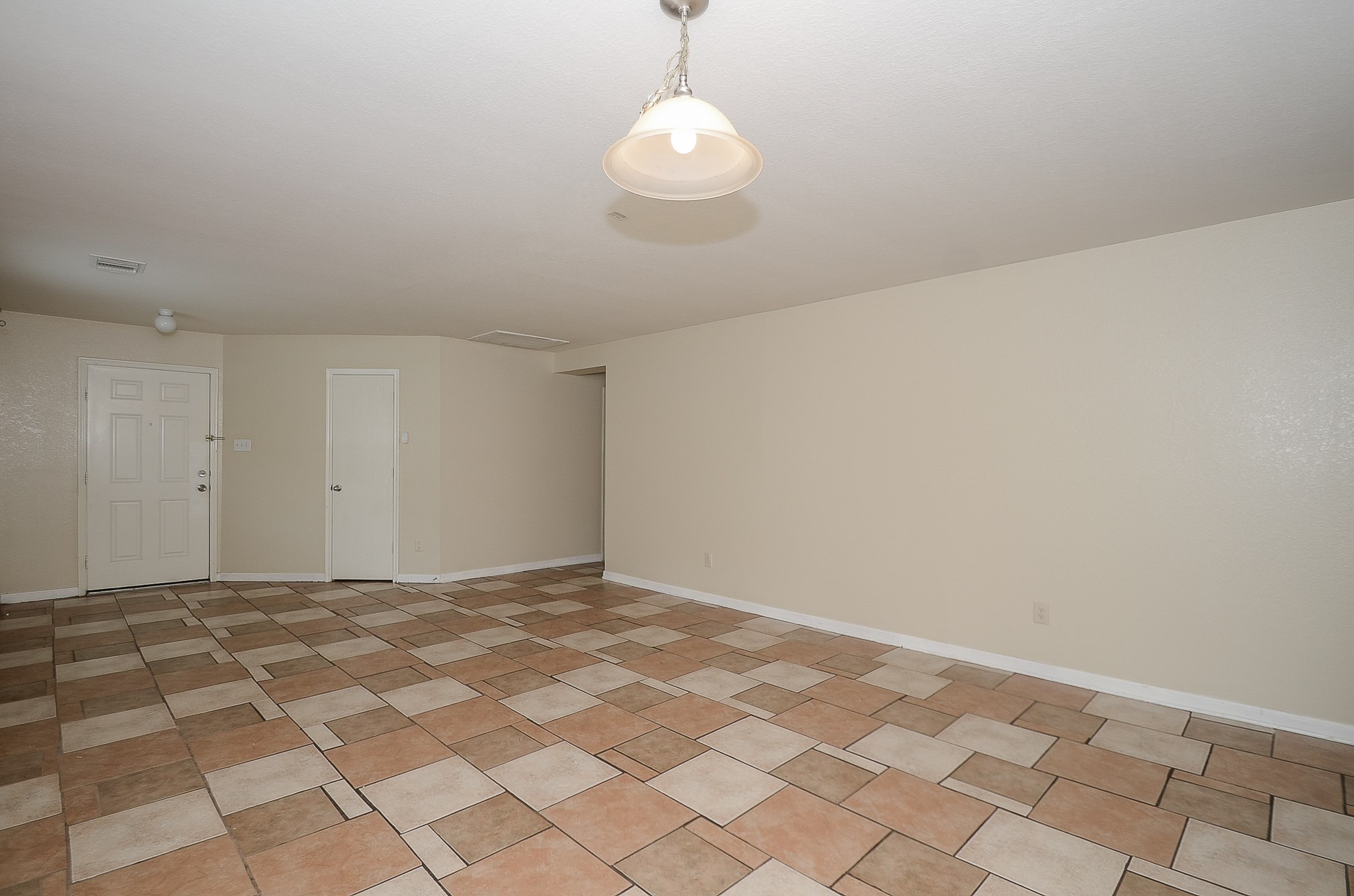 11711 Wainscot Court Houston, TX 77038 - Photo 5 of 32 a view of an empty room with a window