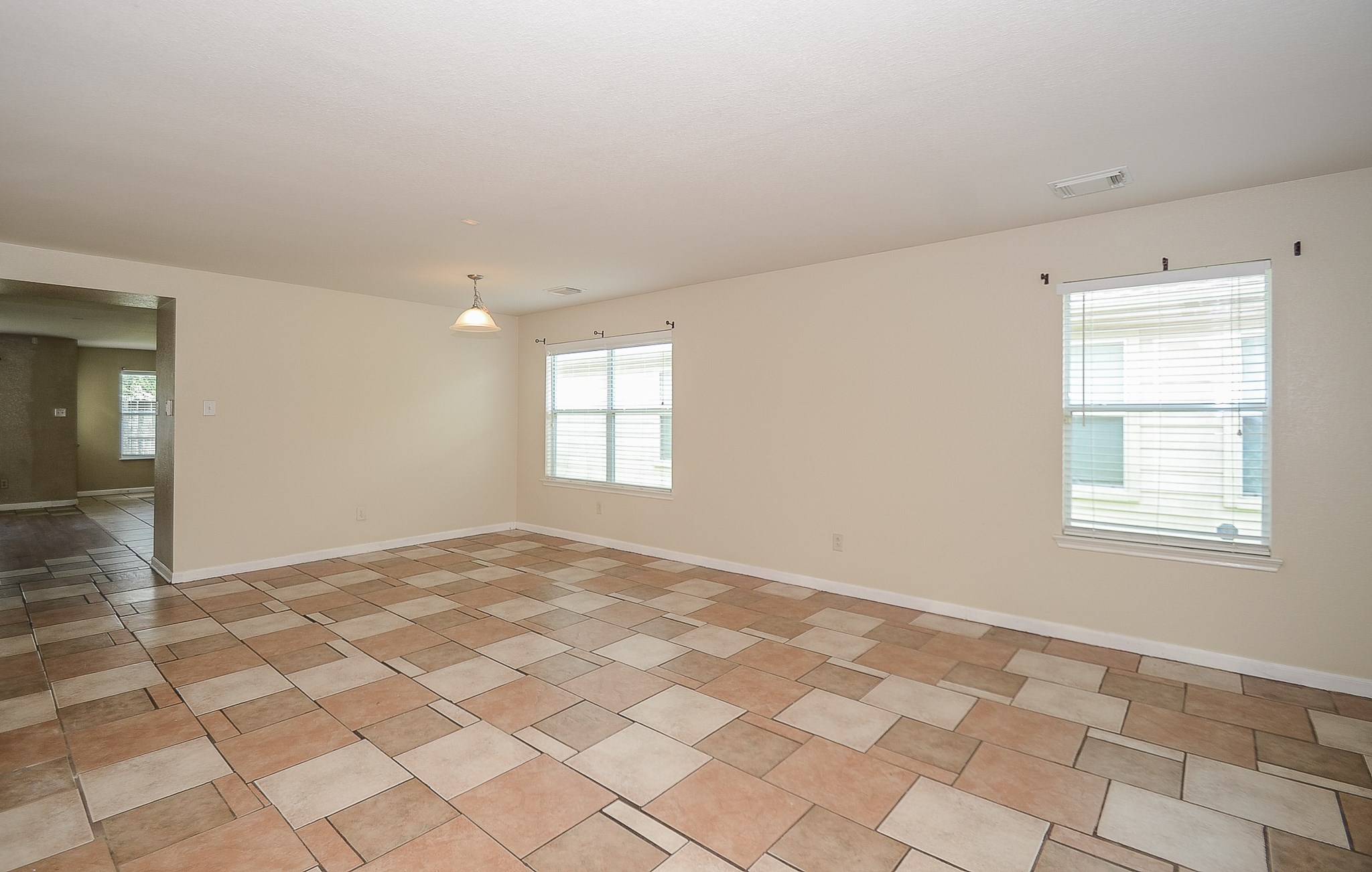 11711 Wainscot Court Houston, TX 77038 - Photo 6 of 32 a view of an empty room and window
