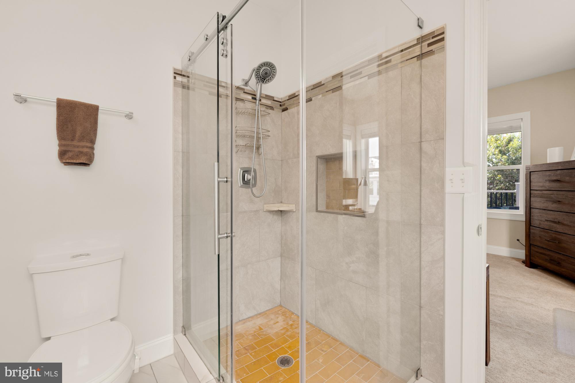 233 S Street Northeast, Unit 4 Washington, DC 20002 - Photo 29 of 37 a bathroom with a shower and a tub