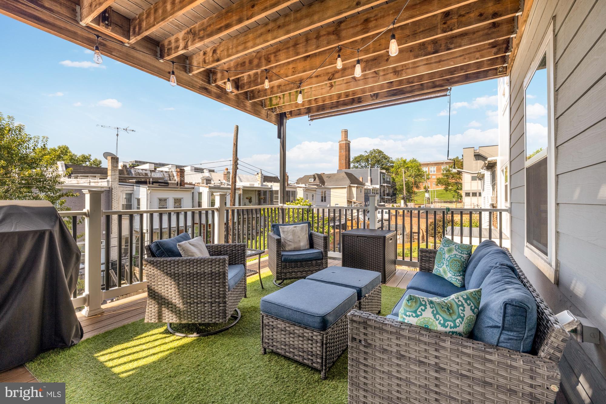 233 S Street Northeast, Unit 4 Washington, DC 20002 - Photo 32 of 37 a balcony with furniture and a view of the balcony