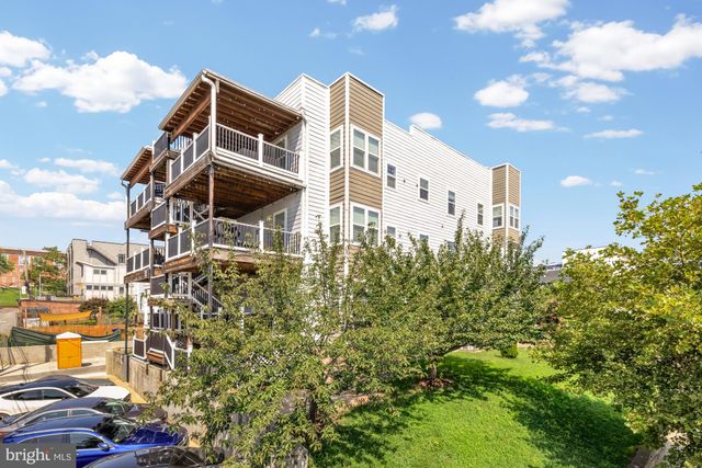 a view of a wooden door and a window