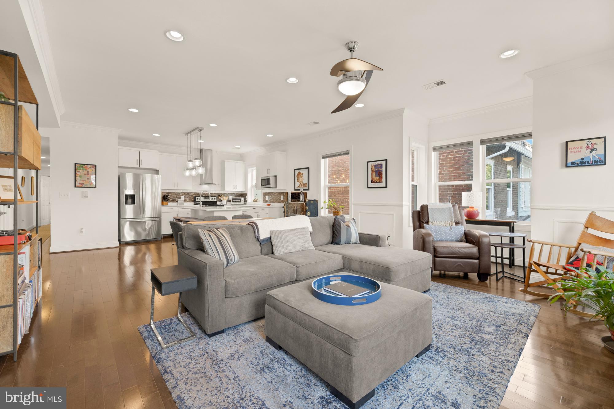 233 S Street Northeast, Unit 4 Washington, DC 20002 - Photo 7 of 37 a living room with furniture kitchen view and a dining table