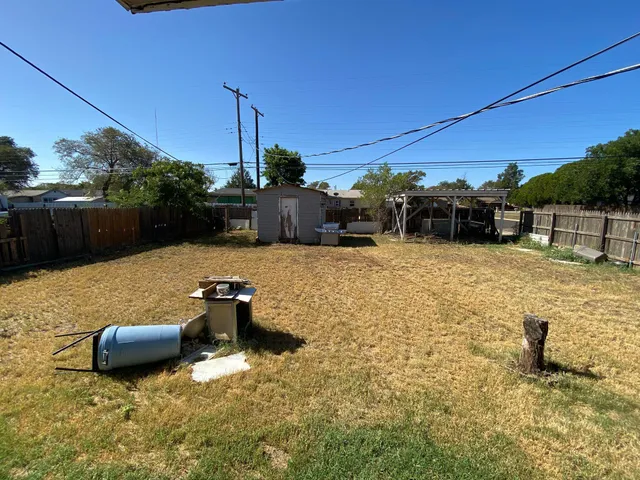 a backyard of a house with seating space