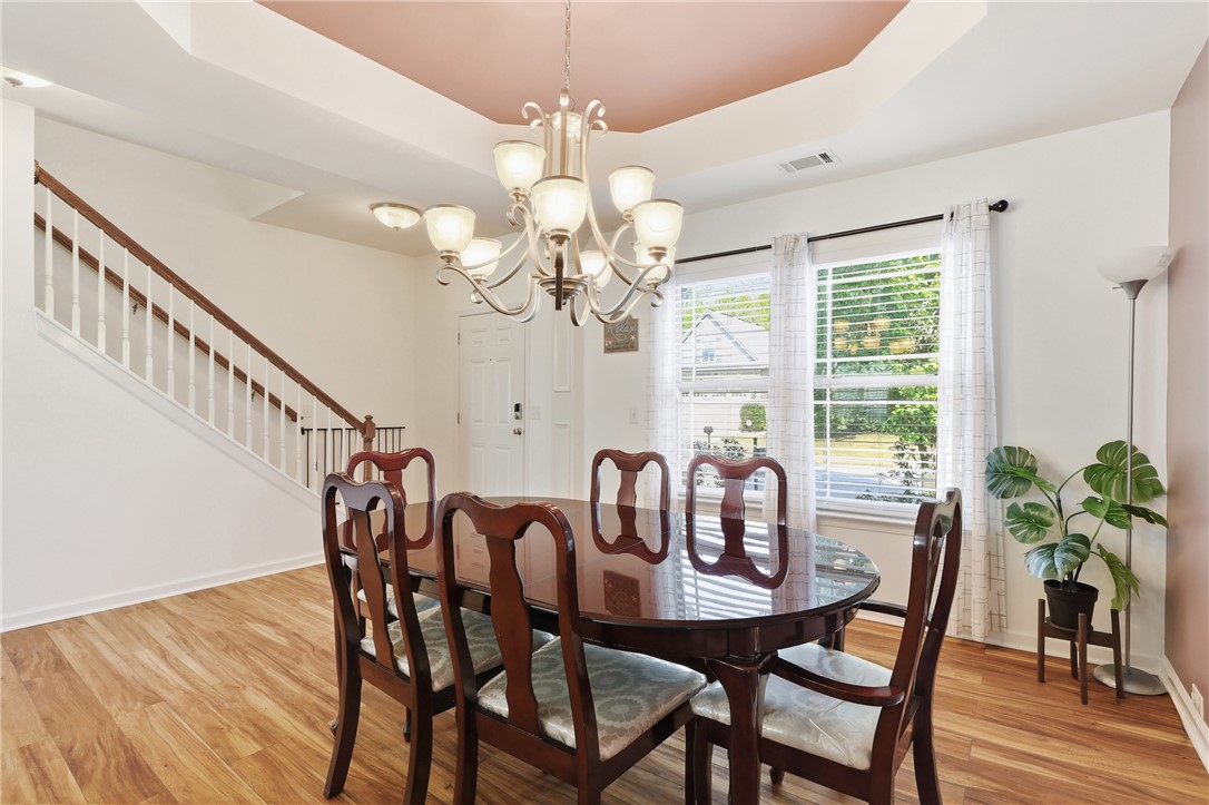 347 Riverdale Road Simpsonville, SC 29680 - Photo 4 of 30 This dining area offers a bright and inviting space for meals and gatherings.