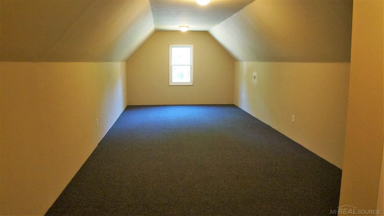 4660 Richardson Road Howell, MI 48843 - Photo 19 of 39 BONUS Room Above Garage