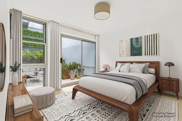 a outdoor living space with furniture and plants