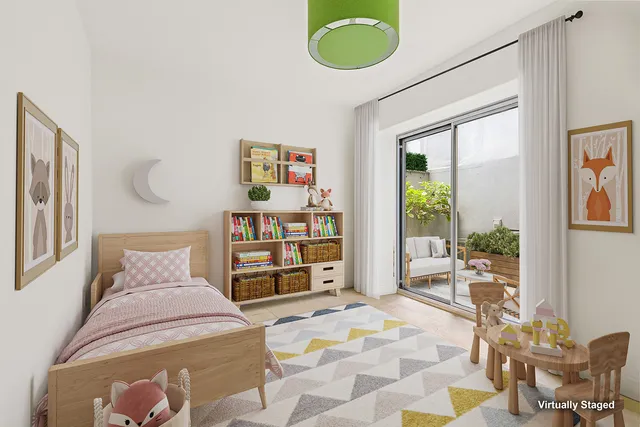 a bathroom with a granite countertop sink mirror vanity and toilet