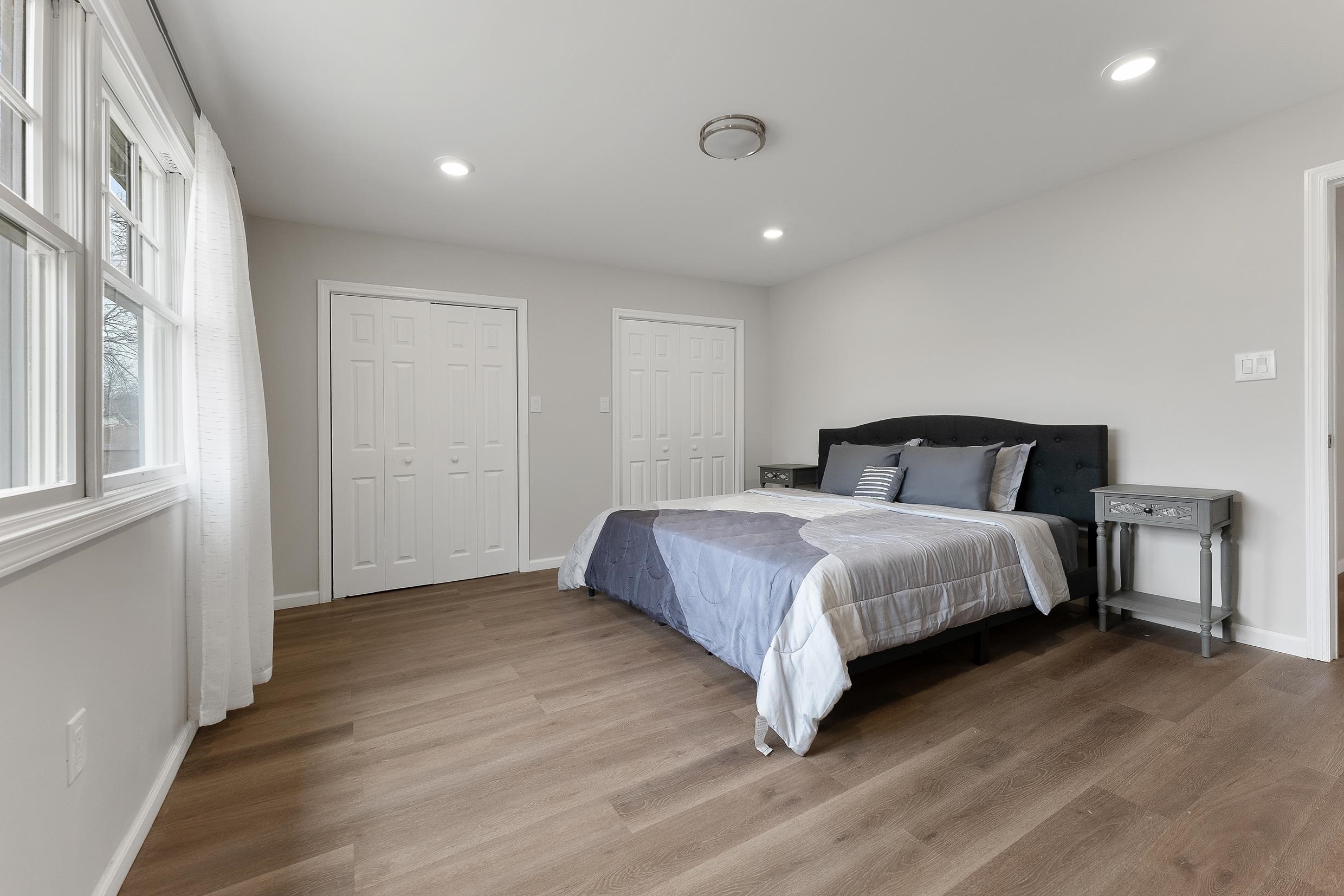 545 Seashore Road Erma, NJ 08204 - Photo 14 of 22 a bedroom with a bed and wooden floor