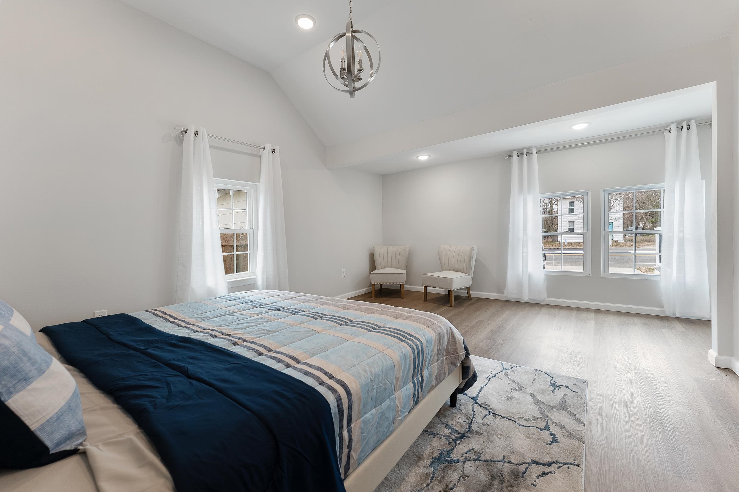 545 Seashore Road Erma, NJ 08204 - Photo 16 of 22 a bedroom with bed and wooden floor