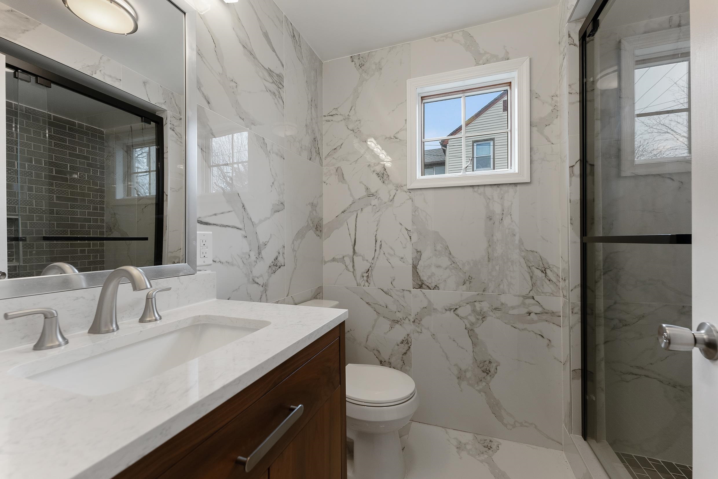 545 Seashore Road Erma, NJ 08204 - Photo 20 of 22 a bathroom with a sink toilet and shower