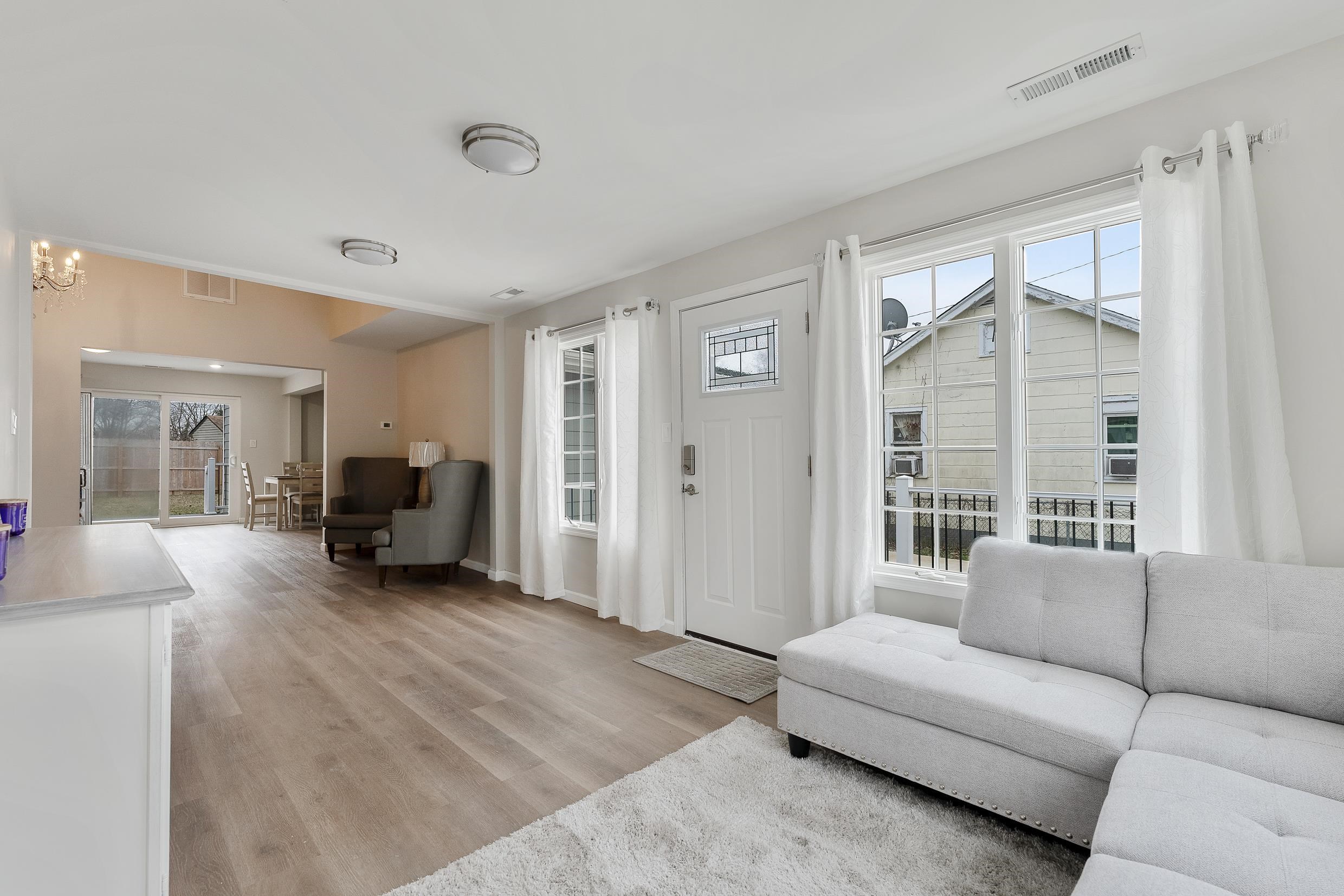 545 Seashore Road Erma, NJ 08204 - Photo 6 of 22 a living room with furniture and a large window