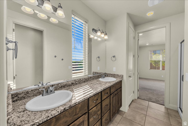 794 North Via Modelo Circle Washington, UT 84780 - Photo 17 of 21 Bathroom with double vanity, light tile patterned floors, light carpet, and recessed lighting