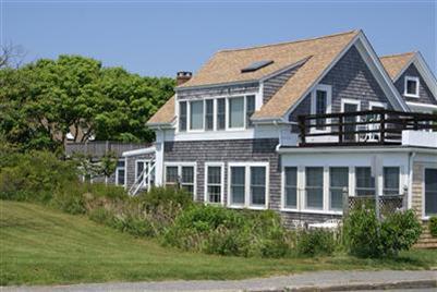 a house view with garden space
