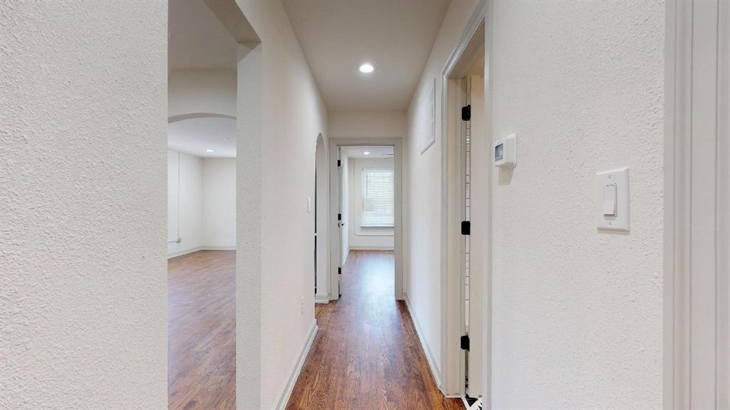 5506 Miller Avenue, Unit 202 Dallas, TX 75206 - Photo 11 of 17 a view of a hallway with wooden floor