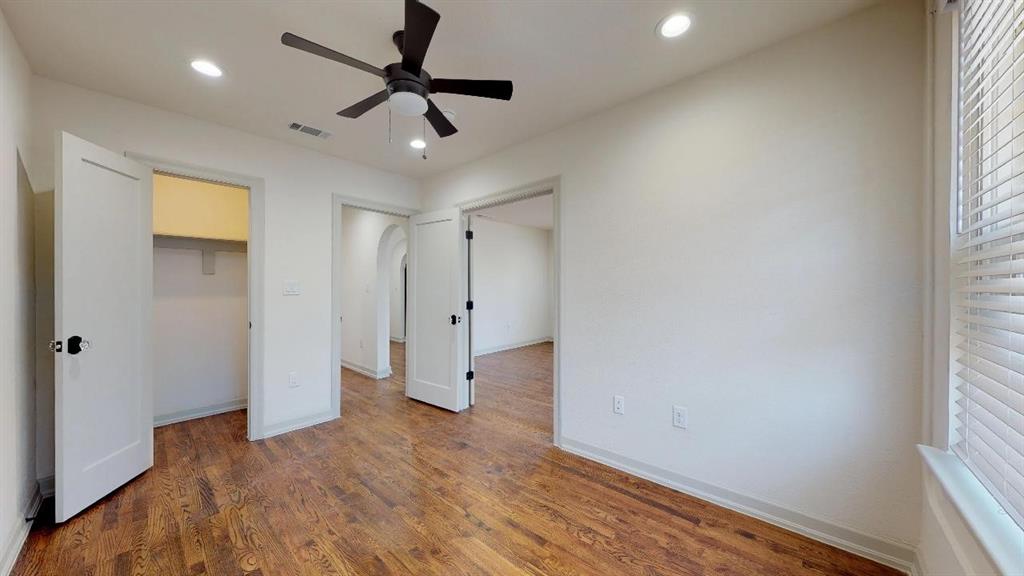 5506 Miller Avenue, Unit 202 Dallas, TX 75206 - Photo 14 of 17 a view of empty room with wooden floor and fan