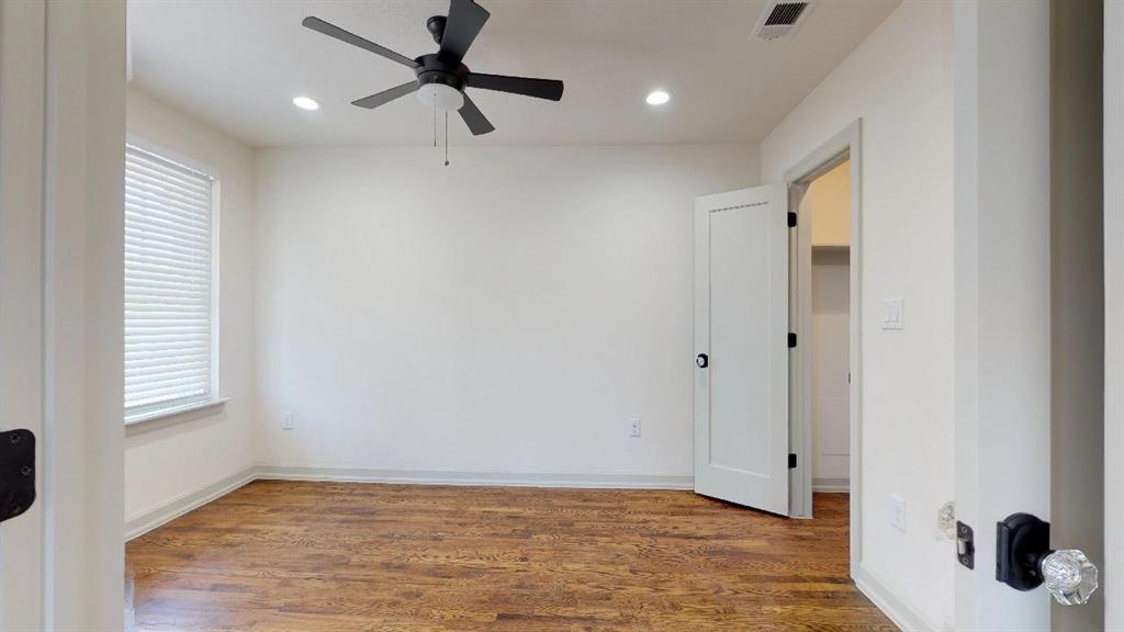 5506 Miller Avenue, Unit 202 Dallas, TX 75206 - Photo 9 of 17 a view of an empty room with a window