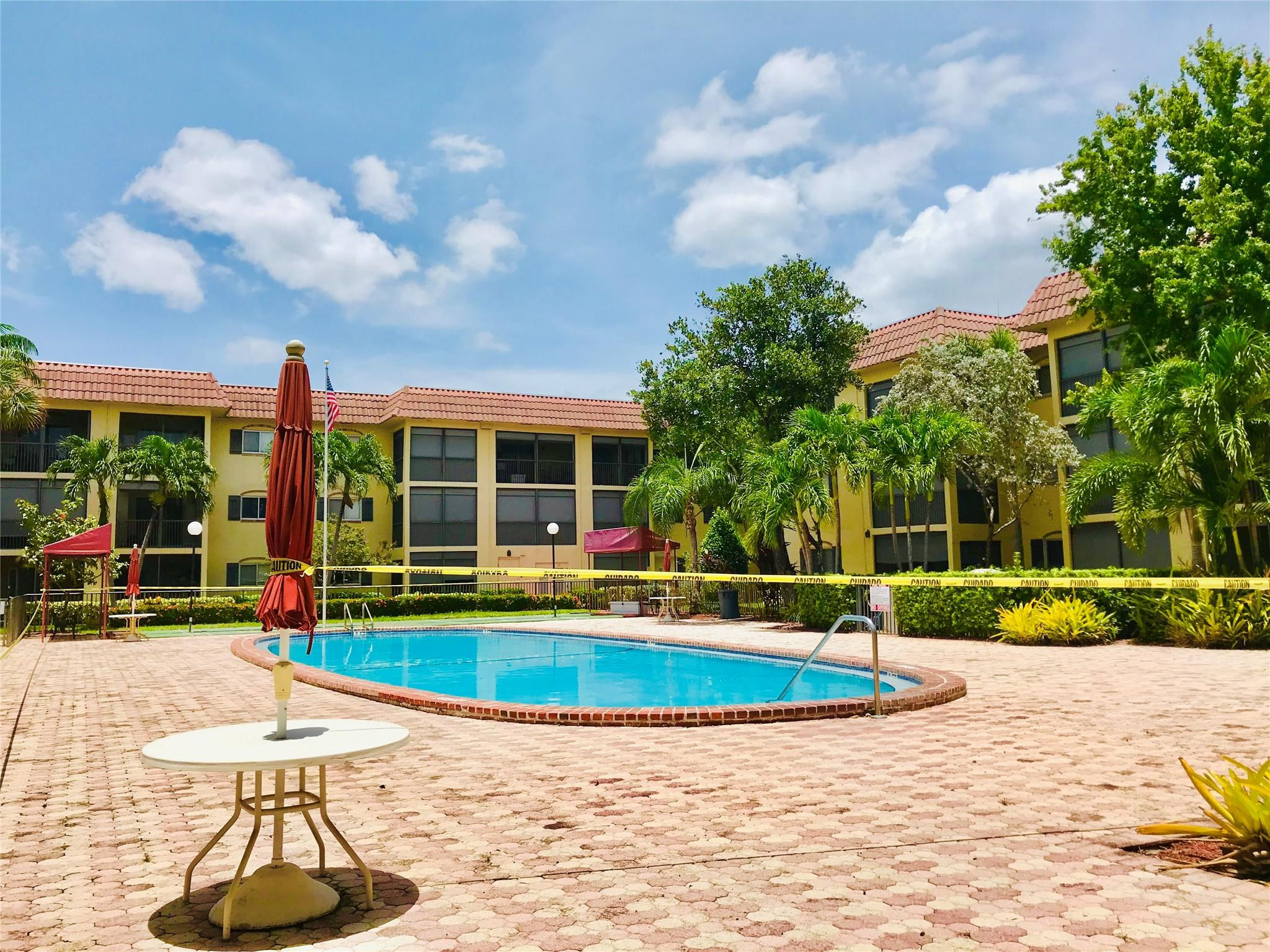 259 South Cypress Road, Unit 536 Pompano Beach, FL 33060 - Photo 19 of 39 a view of outdoor space yard deck and patio