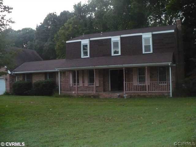 16680 Sandy Ford Road Chesterfield, VA 23838 - Photo 1 of 6 a front view of a house with a yard