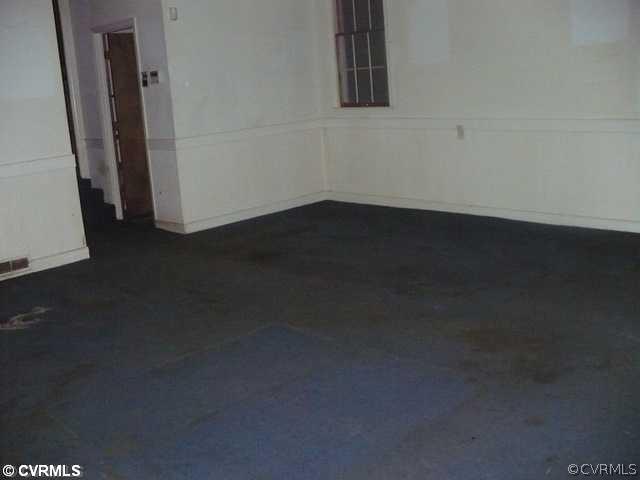 16680 Sandy Ford Road Chesterfield, VA 23838 - Photo 5 of 6 a view of a small space with wooden floor and a window