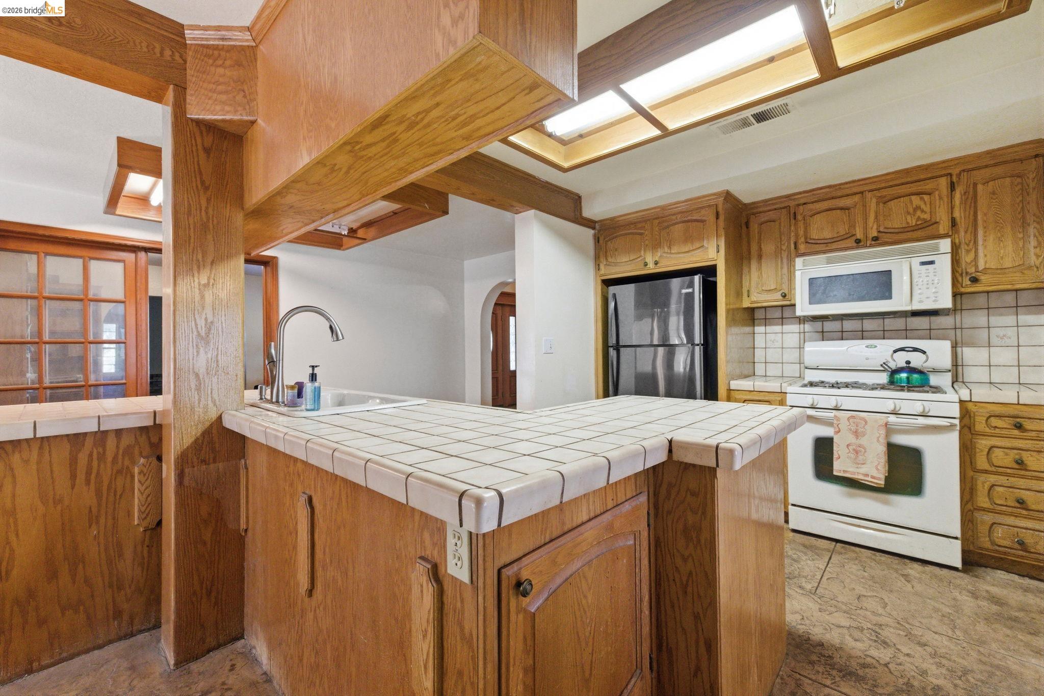 23608 Porcina Way Columbia, CA 95310 - Photo 36 of 51 a kitchen that has a sink and a stove