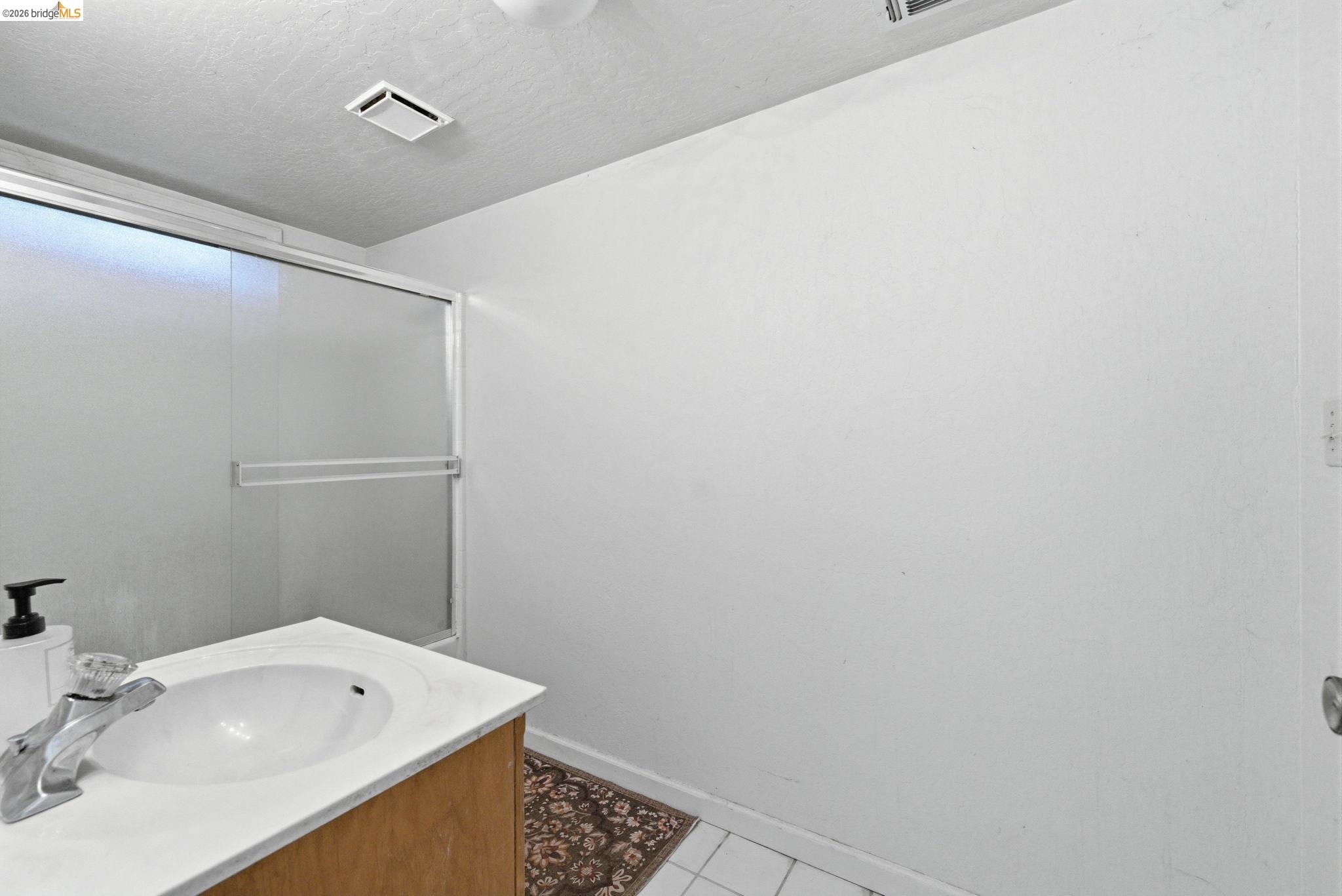 23608 Porcina Way Columbia, CA 95310 - Photo 40 of 51 a bathroom with a sink and a mirror