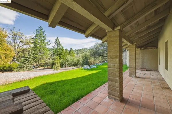 a view of a porch with a yard