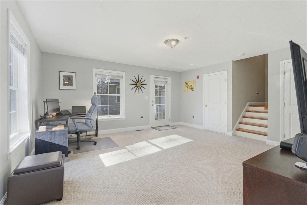 66 Compass Point, Unit 66 North Andover, MA 01845 - Photo 9 of 42 a living room with furniture and wooden floor