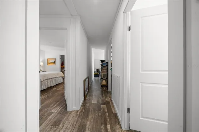 a bathroom with a toilet a sink and a mirror