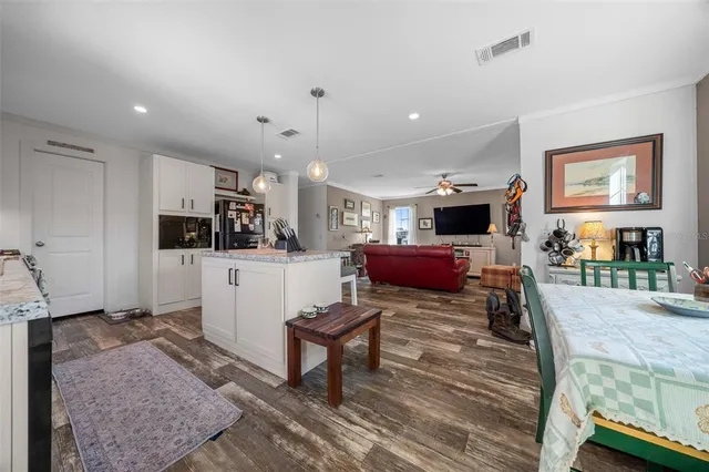 a view of a livingroom with furniture and toys