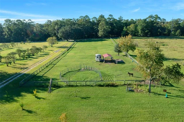 a view of a golf course with a lake