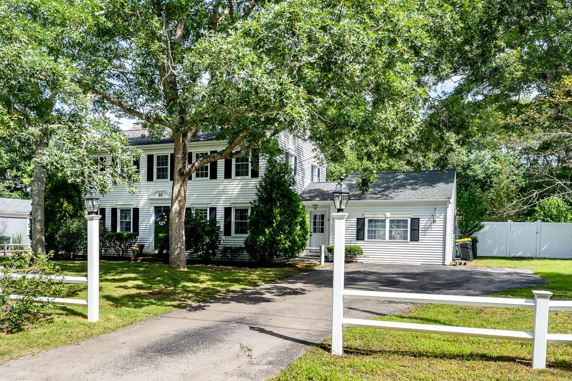 front view of a house with a yard