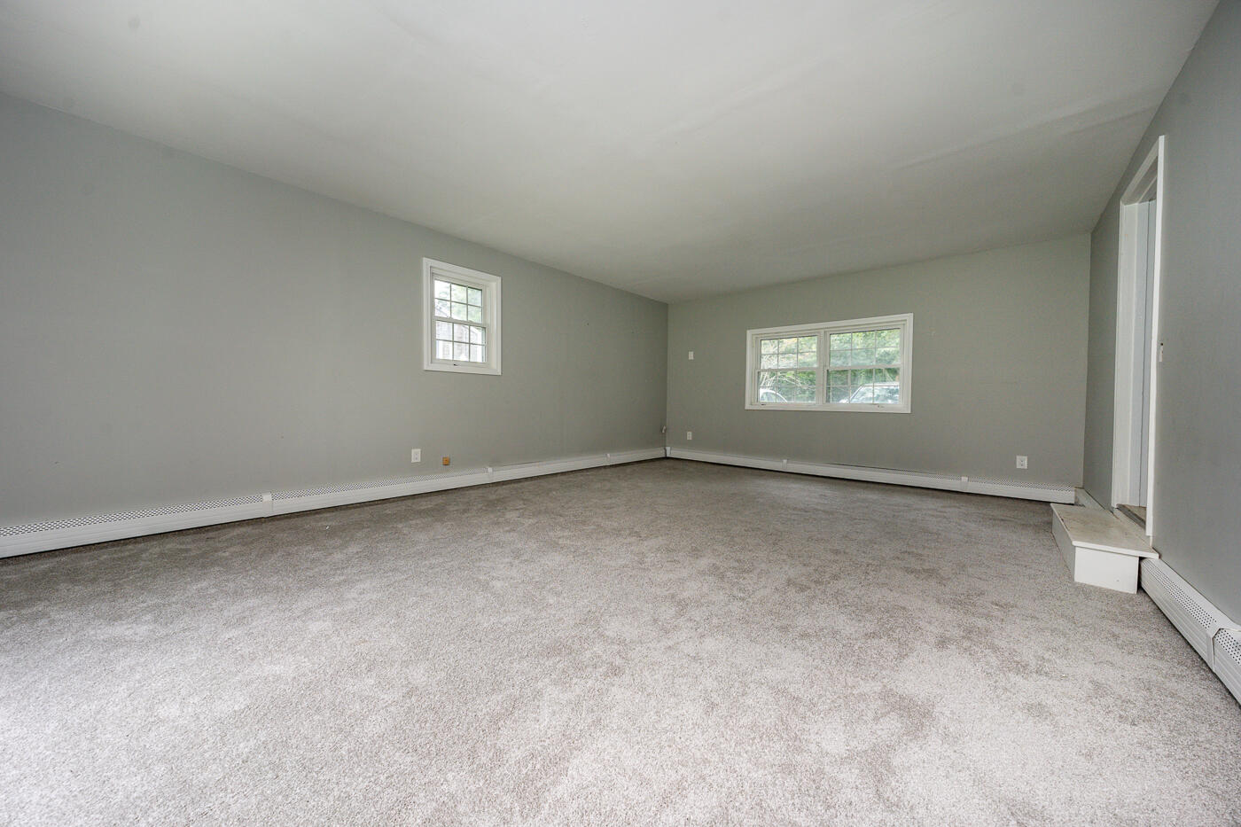 82 Skunknet Road Centerville, MA 02632 - Photo 11 of 35 a view of an empty room with a window
