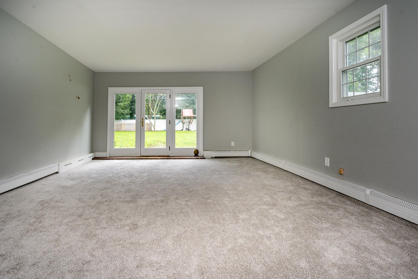 82 Skunknet Road Centerville, MA 02632 - Photo 13 of 35 a view of an empty room with a window