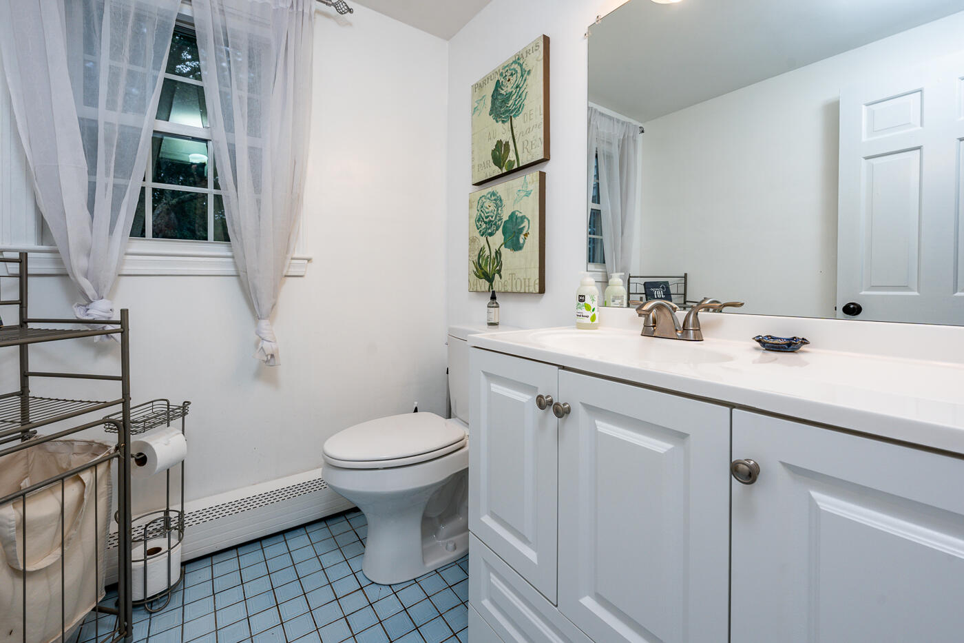 82 Skunknet Road Centerville, MA 02632 - Photo 18 of 35 a bathroom with a sink toilet and shower