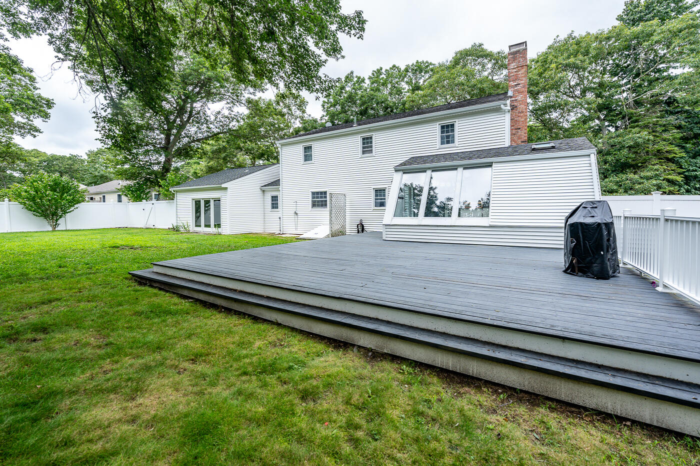 82 Skunknet Road Centerville, MA 02632 - Photo 29 of 35 a view of a house with a yard