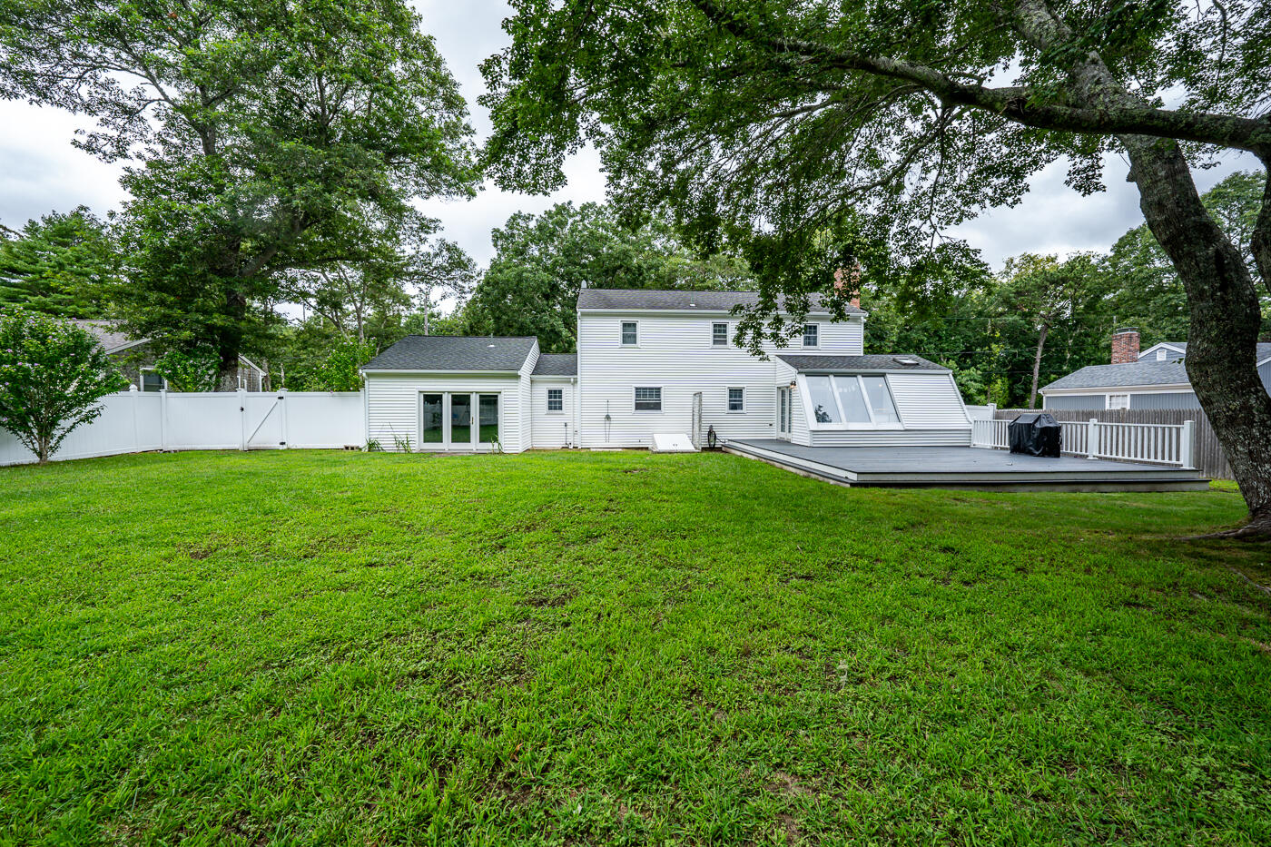82 Skunknet Road Centerville, MA 02632 - Photo 34 of 35 a house view with a garden space