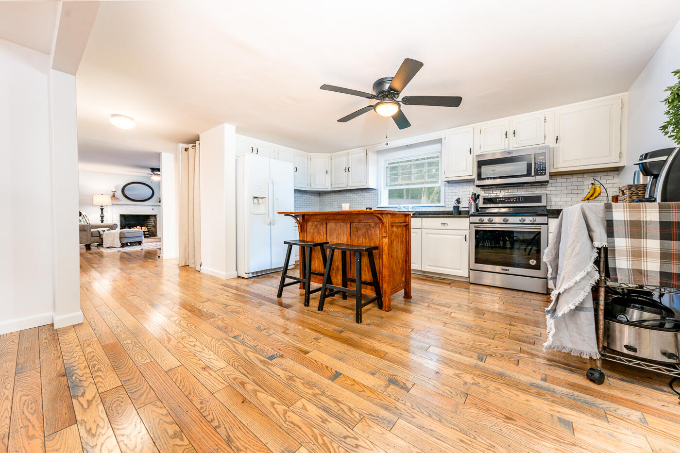 82 Skunknet Road Centerville, MA 02632 - Photo 10 of 35 a living room with stainless steel appliances furniture a kitchen view and living room view