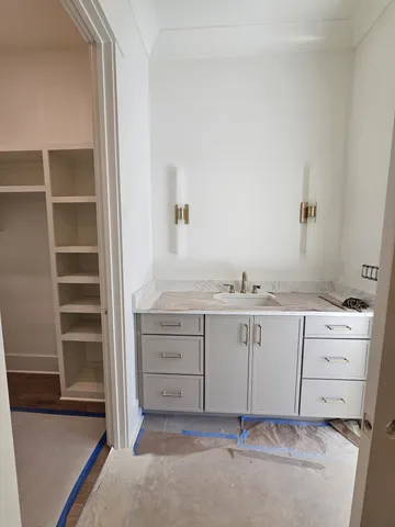 a view of a patio with table and chairs