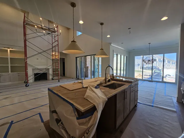 a bathroom with a tub and shower