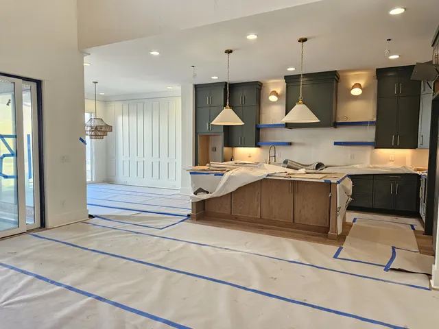 a bathroom with a bathtub and shower