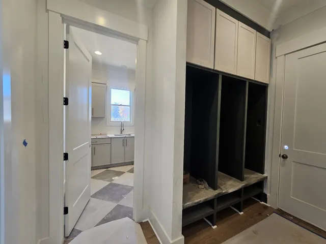 a view of a hallway with entryway