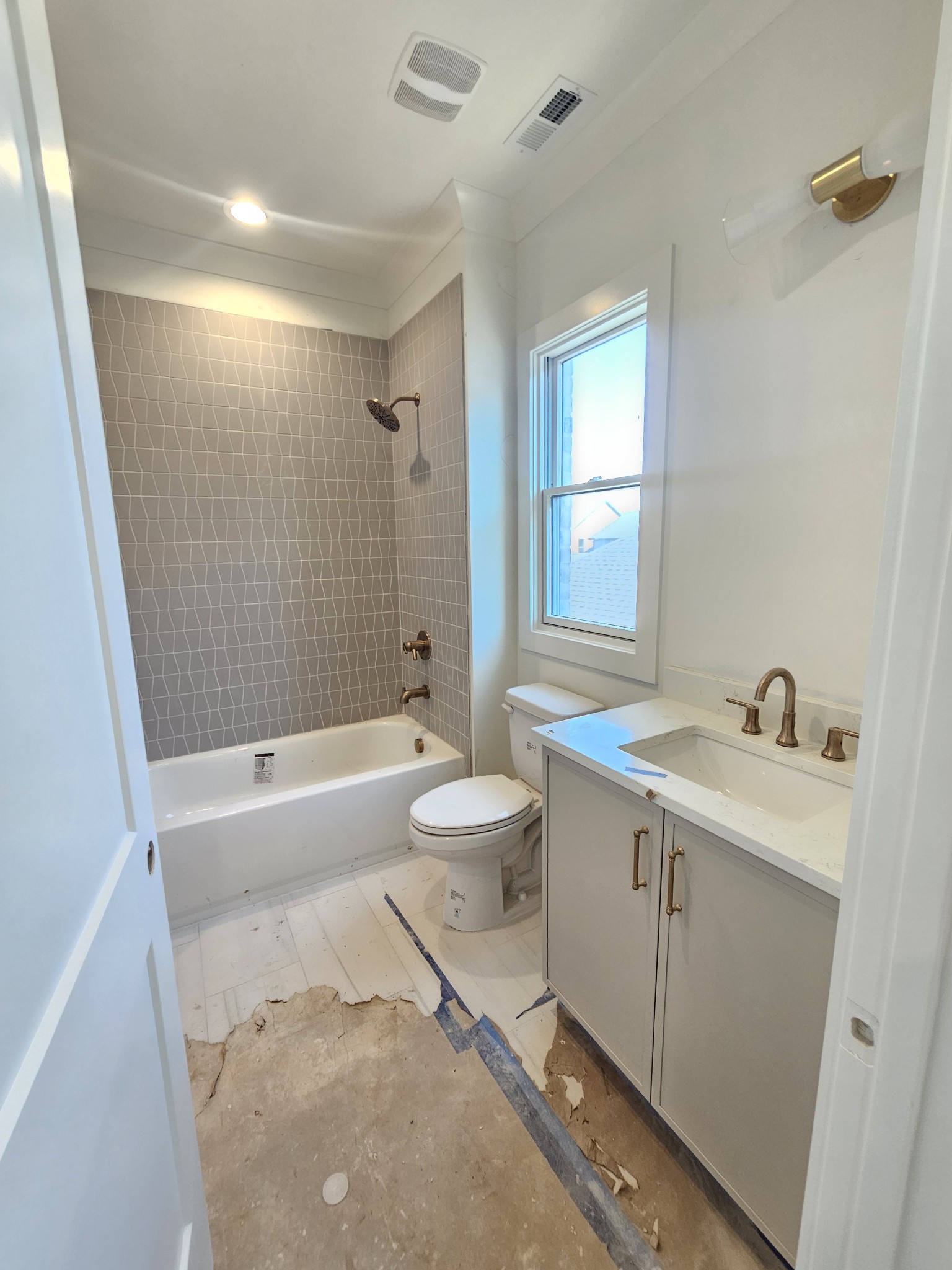 2962 Del Rio Pike Franklin, TN 37069 - Photo 56 of 69 a bathroom with a sink a toilet and shower