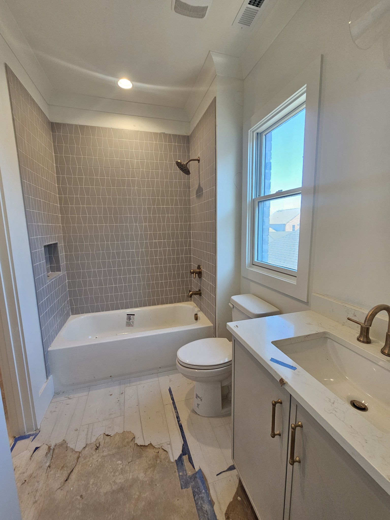 2962 Del Rio Pike Franklin, TN 37069 - Photo 57 of 69 a bathroom with a sink a toilet a tub and shower