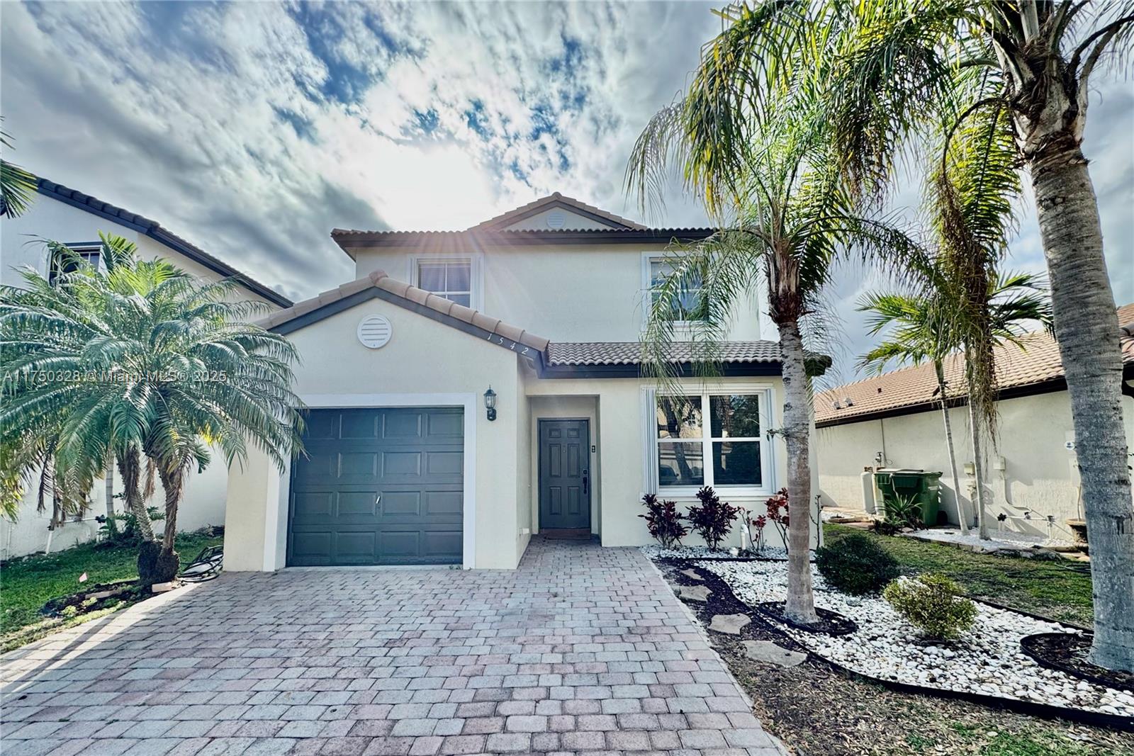 1542 Southeast 20th Road Homestead, FL 33035 - Photo 1 of 22 a view of a house with a patio