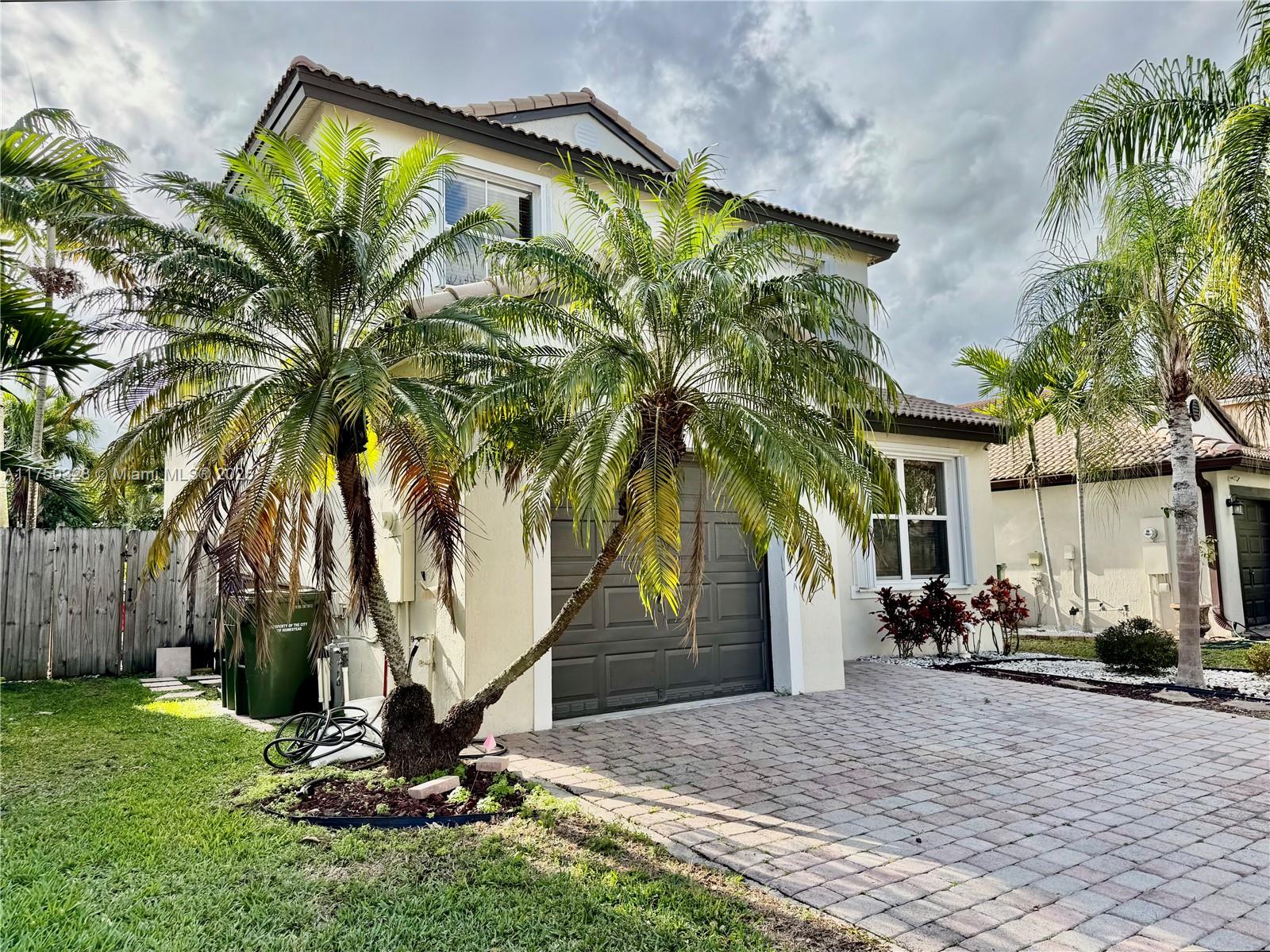 1542 Southeast 20th Road Homestead, FL 33035 - Photo 6 of 22 a view of a backyard with a small cabin