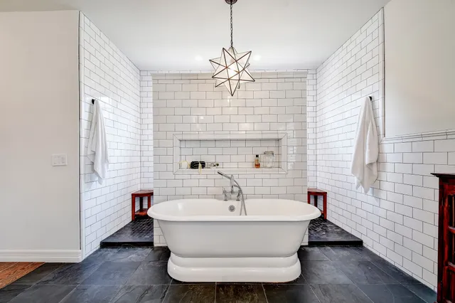 an aerial view of houses with yard