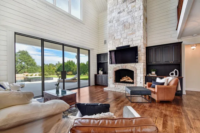 a bed room with bed and a flat tv screen