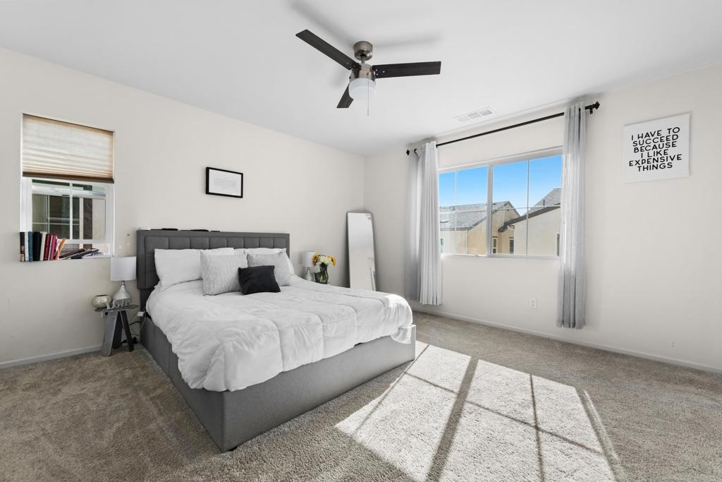 231 Woodland Place Fallbrook, CA 92028 - Photo 7 of 9 a bedroom with bed and window